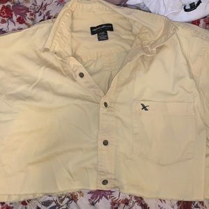 cropped yellow button up shirt